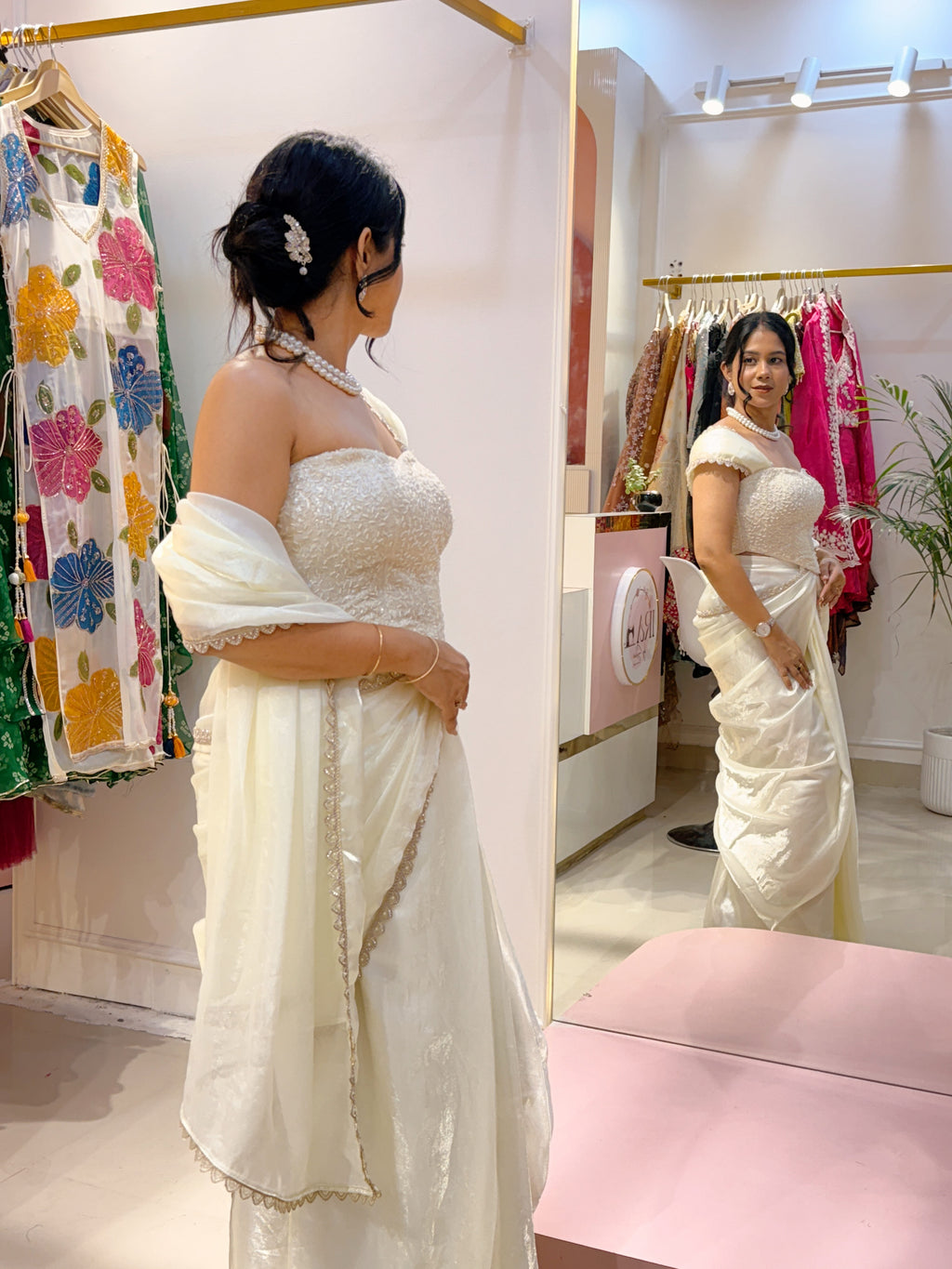 Off white pre drape saree and corset blouse