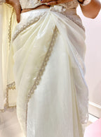 Off white pre drape saree and corset blouse