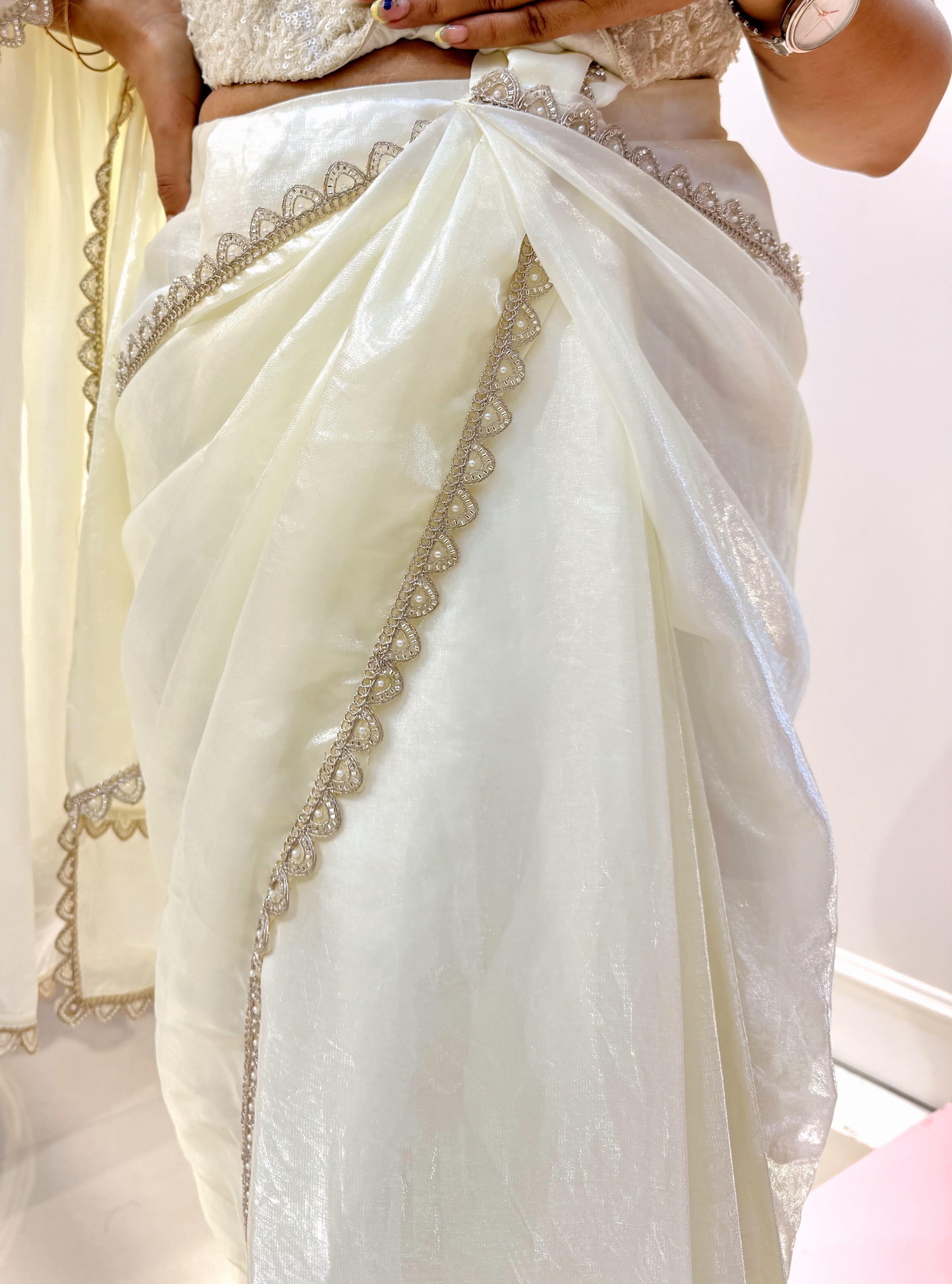 Off white pre drape saree and corset blouse