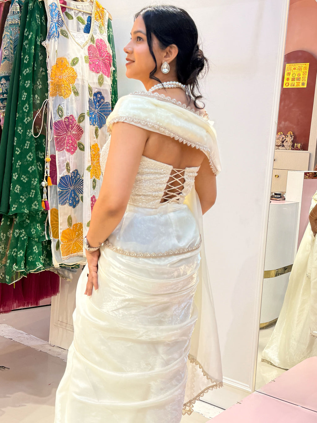 Off white pre drape saree and corset blouse