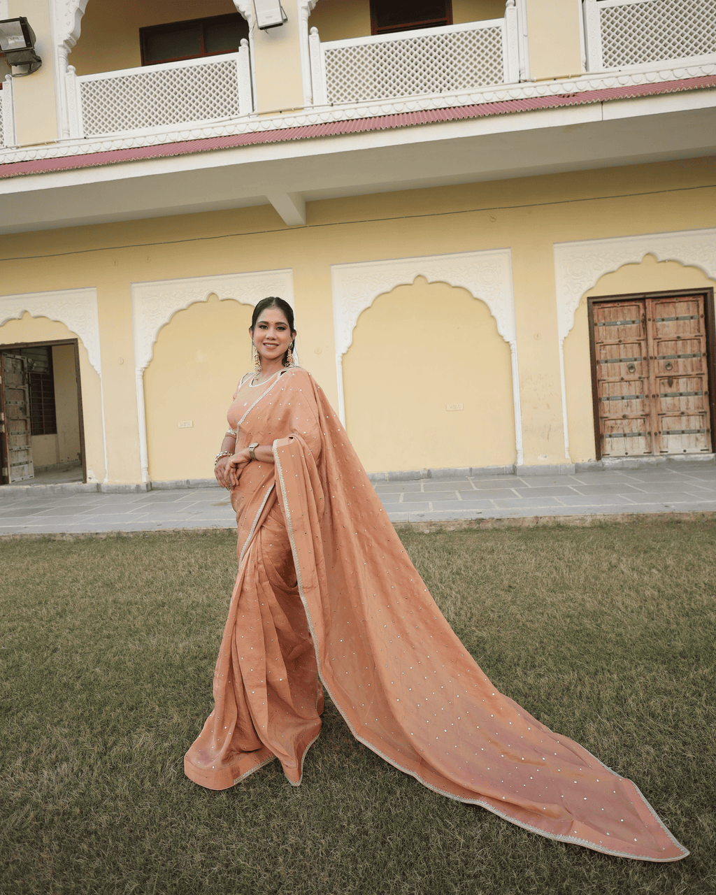 Peach Mukesh Work Cosmo Saree with unstitched blouse piece