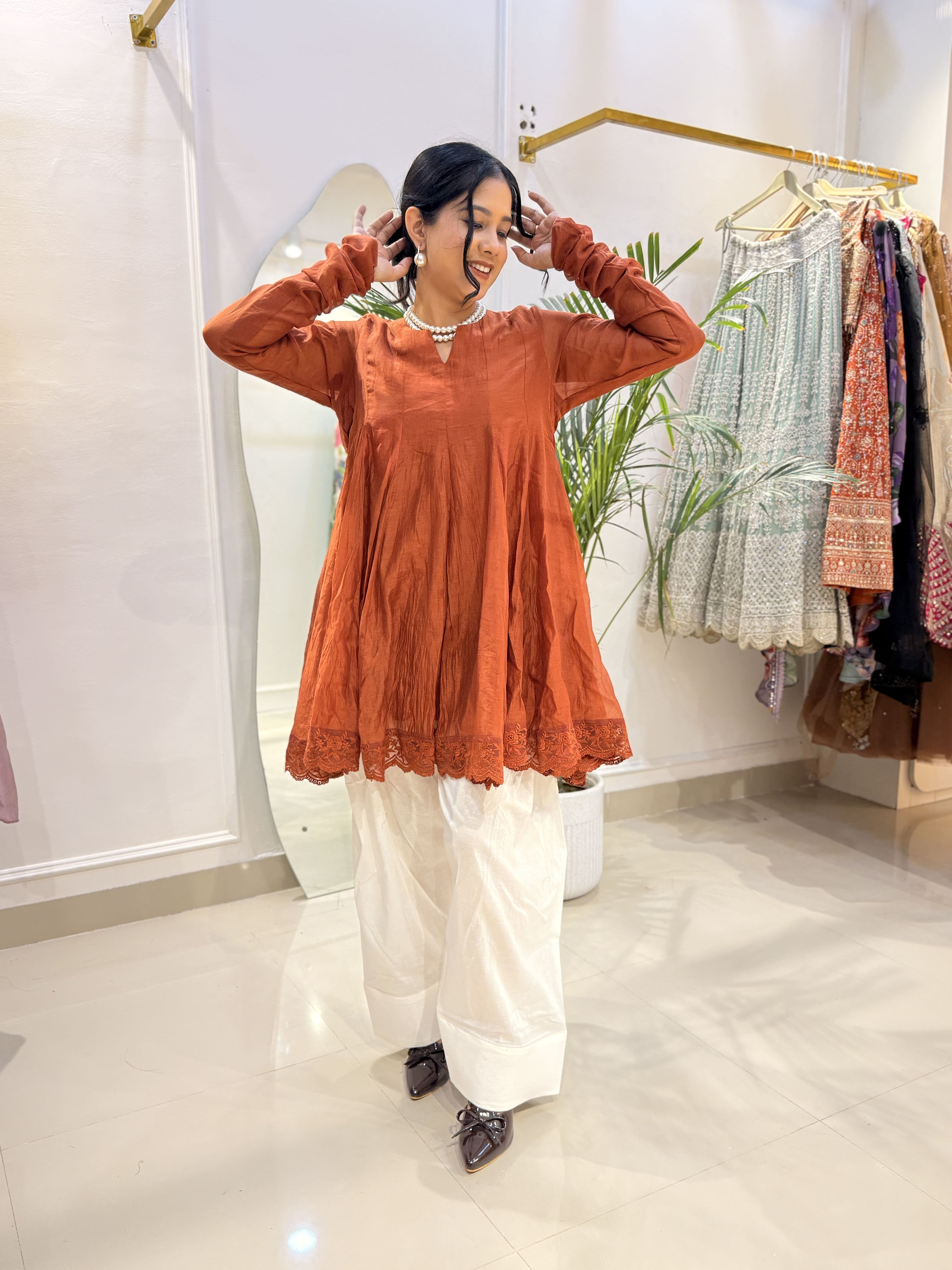 Rust Orange Crinkled Cotton Peplum Kurta Set with White Palazzo